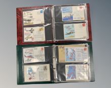 Two Avon stamp albums containing a total of 124 First Day Covers.