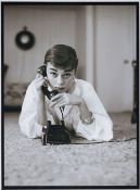 After Mark Shaw 1921-1969 - Audrey Hepburn on the telephone in December 7,