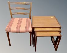 A nest of three teak G Plan tables and a mid 20th century dining chair