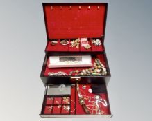 A contemporary lift out jewelry box contain costume beads, lady's wristwatches, earnings, broaches,