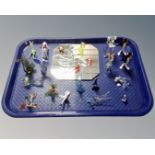 A tray of a collection of glass animal ornaments together with a mirrored display stand.