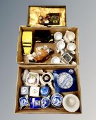 Three boxes containing assorted Ringtons ceramics including collector's tea pots, mugs,