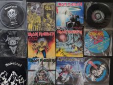 Collection of Picture 7 inch records of Motorhead, Saxon, Ultra! Noise and Iron Maiden singles.