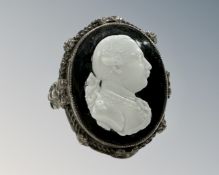 A 19th century German silver ring depicting George III in hard stone relief