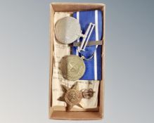 A small tray of medals containing Nato former Yugoslavia with ribbon, 1939-45 star, Defence Medal.