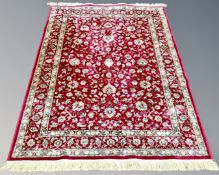 A machine made rug of Keshan design,