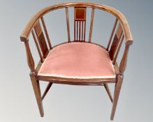 A late Victorian inlaid mahogany tub armchair