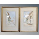 A pair of watercolours depicting figures in a rural village in gilt frames