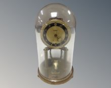 An early 20th century Violeta clock under shade