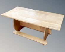 An early 20th century light oak coffee table
