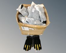 A box of black and yellow winter running gloves, various sizes, new.