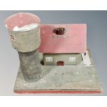 A 20th century vintage electric model of a farmhouse with silo