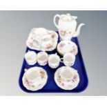 A tray of sixteen piece Royal Crown Derby posies tea service together with matching miniature cake