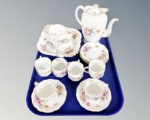 A tray of sixteen piece Royal Crown Derby posies tea service together with matching miniature cake
