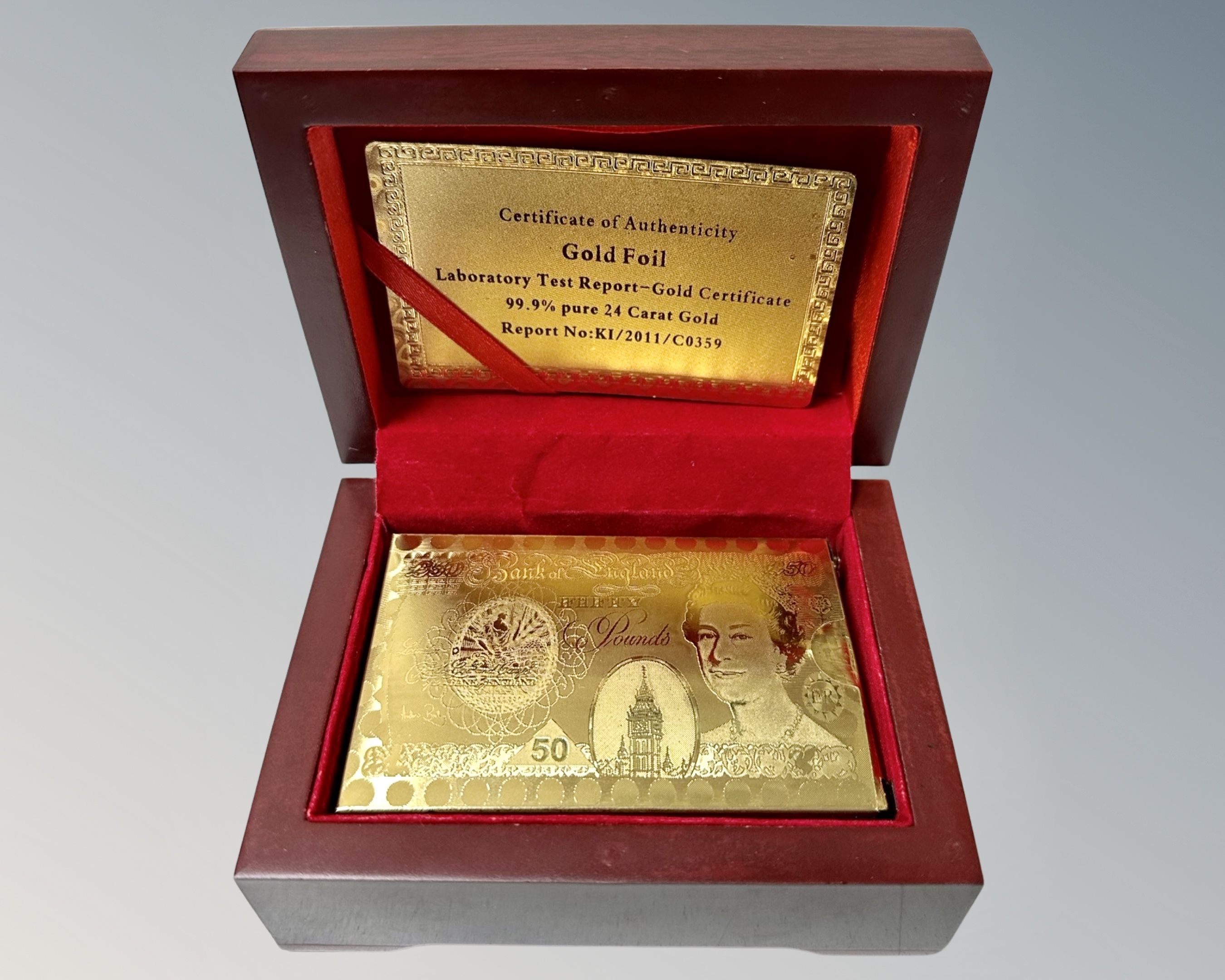 A set of gold foil coated playing cards in box