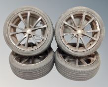 A set of four Alfa Romeo alloy wheels with sport Macro radial tubeless 215/45ZR 17 91W XL tyres
