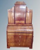 A Scandinavian barrel fronted mahogany bureau bookcase with inlaid decoration