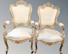 A pair of 19th century gilded armchairs