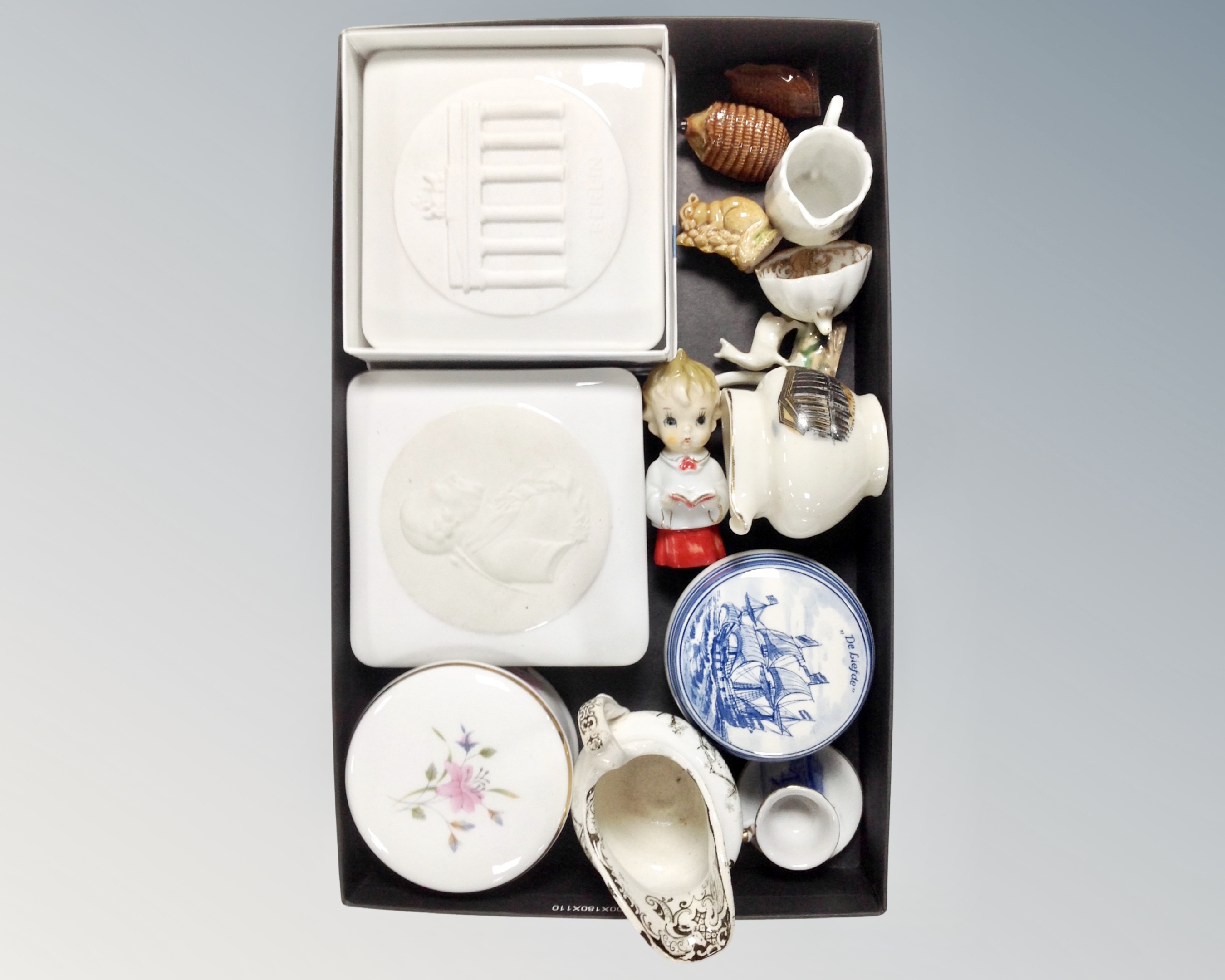 A tray of ceramics to include Wade whimsies, continental dish and cover,