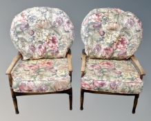 A pair of 20th century beech framed armchairs