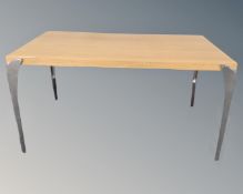 A Scandinavian contemporary light oak dining table