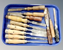 A tray of twelve vintage wood working chisels