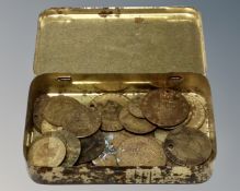 A tin of Georgian coins