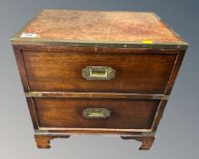 A mahogany brass bound ship's style two drawer chest with leather panel top