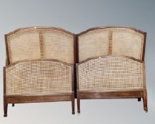 A pair of mahogany and bergere 3' bed frames