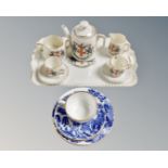 A crested ware miniature tea for two on tray with the arms of the city of London together with