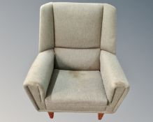 An early 20th century Scandinavian armchair in green fabric