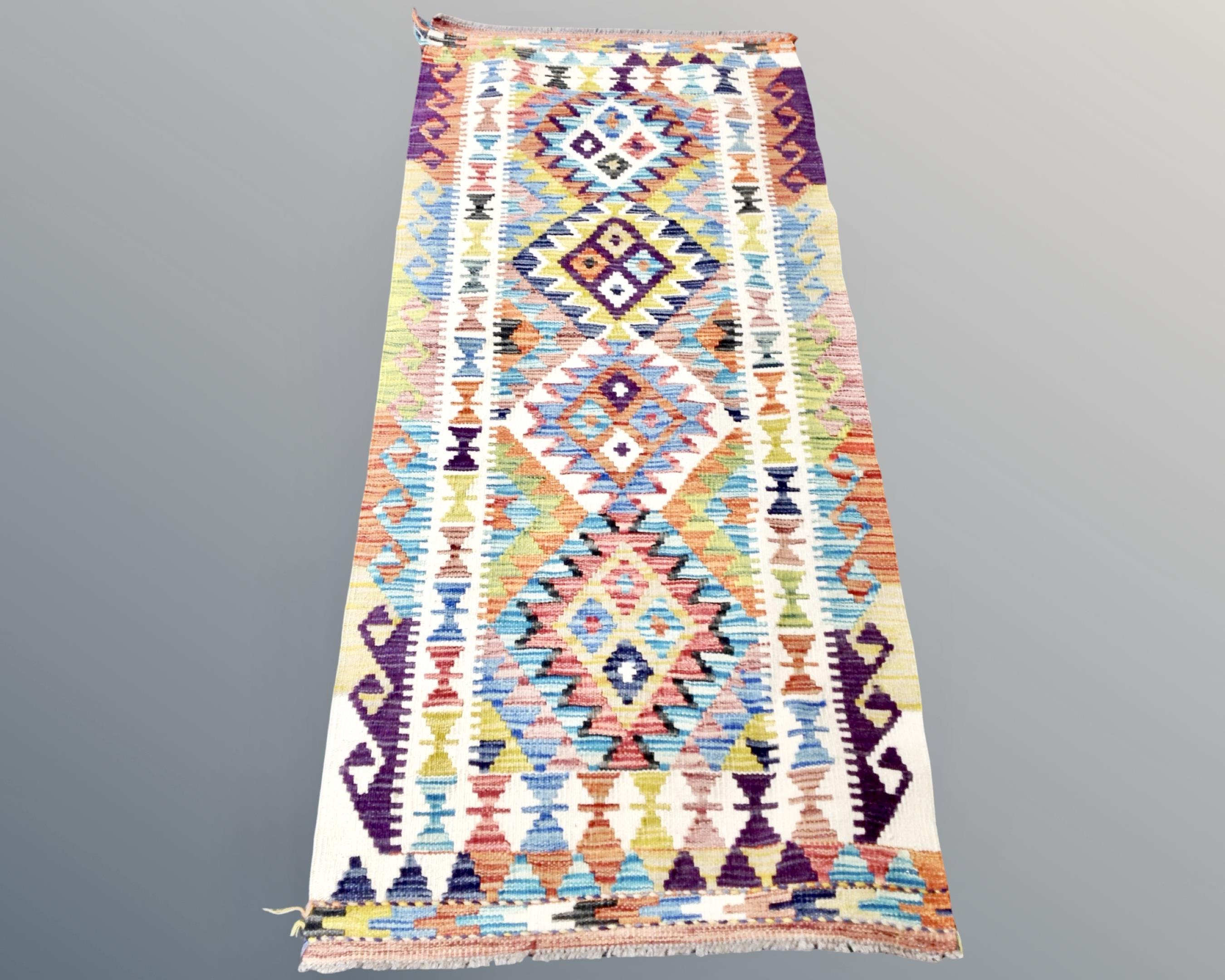 A Chobi Kilim runner 150 cm x 65 cm