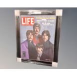 A reproduction Life Asia edition Beatles poster in frame