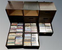Nine leather effect storage drawers containing cds