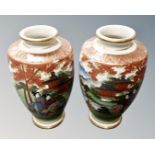 A pair of Soho hand-painted vases in the Satsuma design, 18cm high.