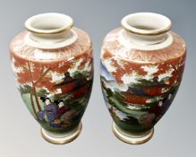 A pair of Soho hand-painted vases in the Satsuma design, 18cm high.