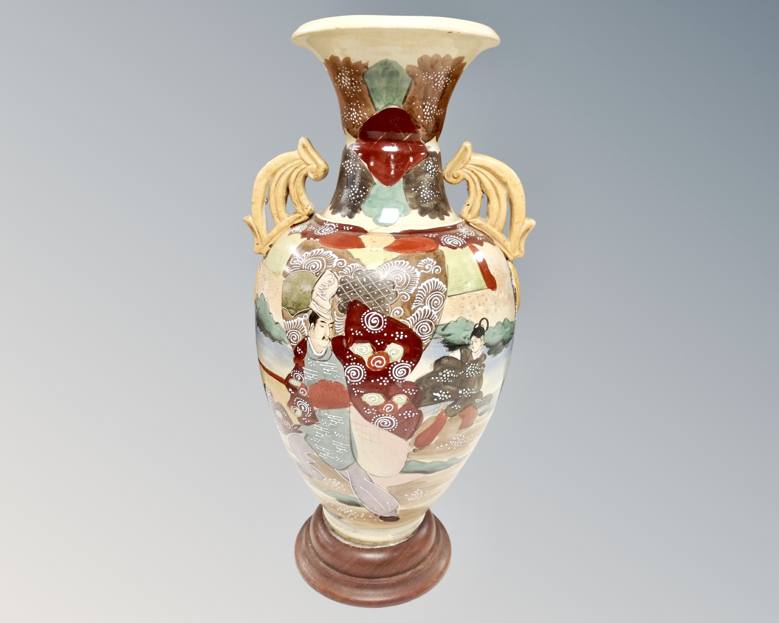 An early 20th century Japanese twin handled urn, height 54cm.