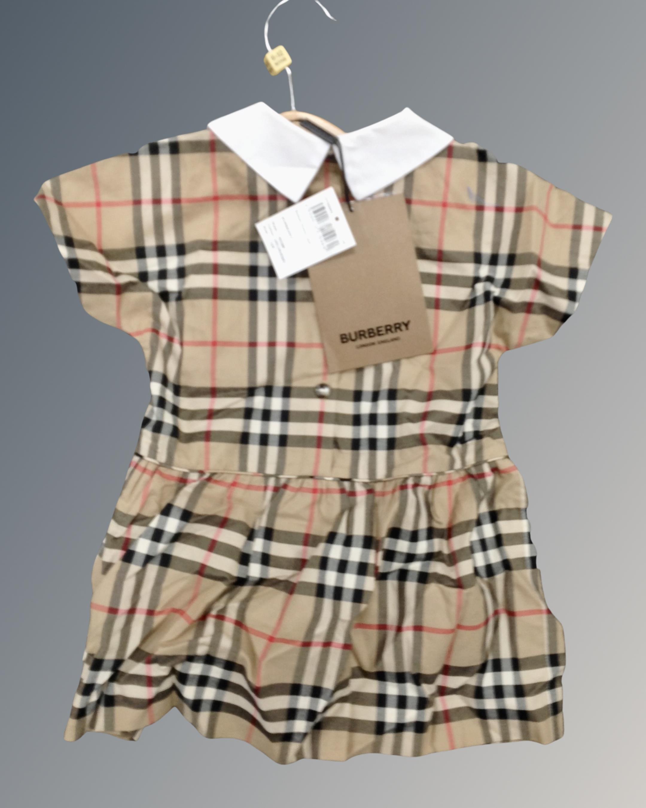 A Burberry Robyn dress size 12 months, new with tags.