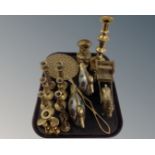 A tray of assorted brass wares, candlestick, horse an cart, chestnut warmer,