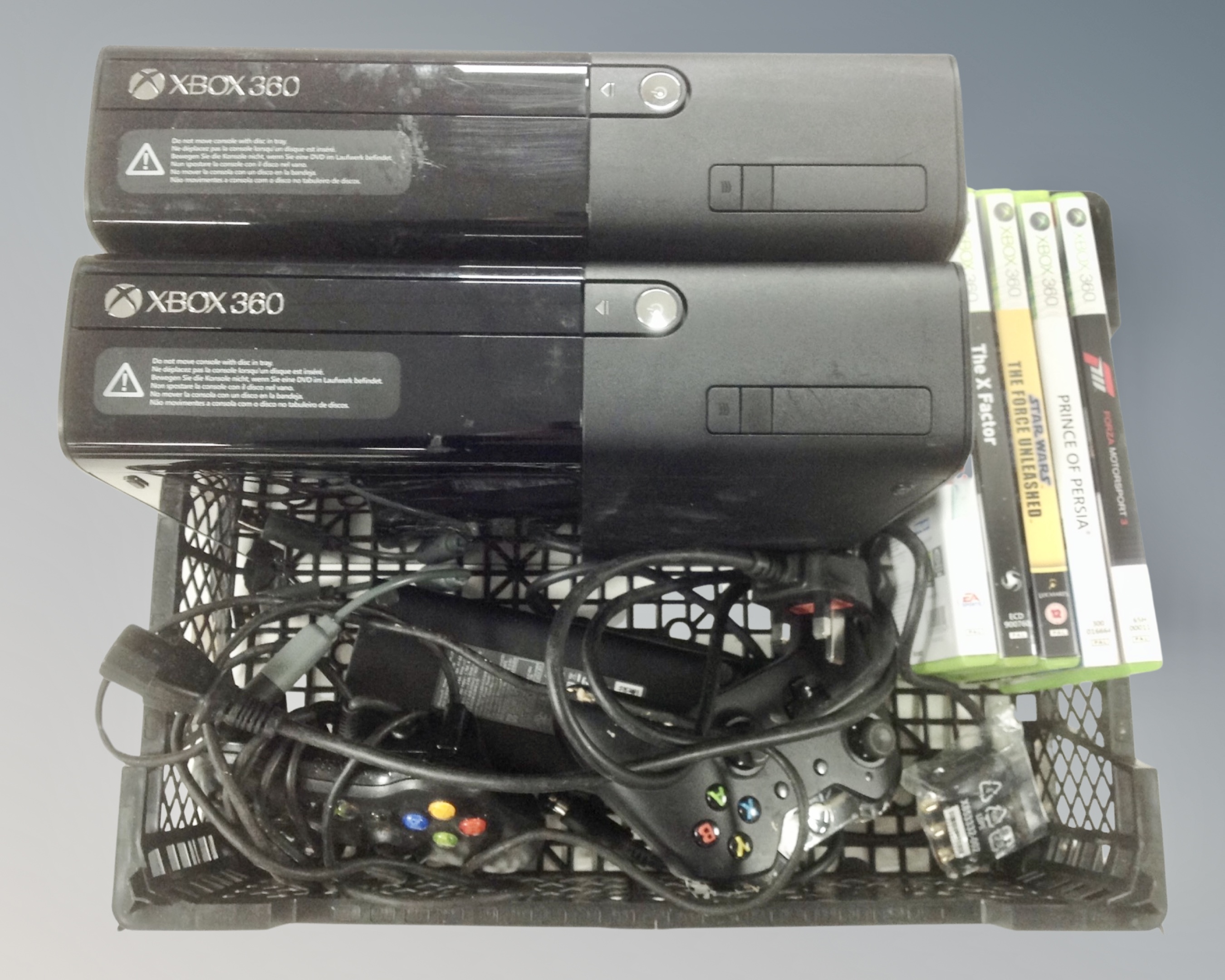 Two X-box 360 units with controllers and five games