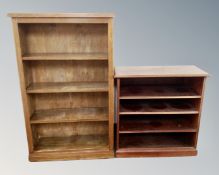 An oak four tier bookcase together with a further smaller mahogany bookcase