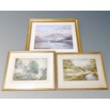 A W Wilson watercolour depicting figures by a river with dwellings beyond in gilt frame together
