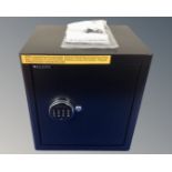 A Wasjoye combination safe with keys and instructions (new)
