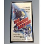 A vintage film poster 'The Trygon Factor' in frame