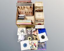 A collection of vinyl records, plastic crate of lps,