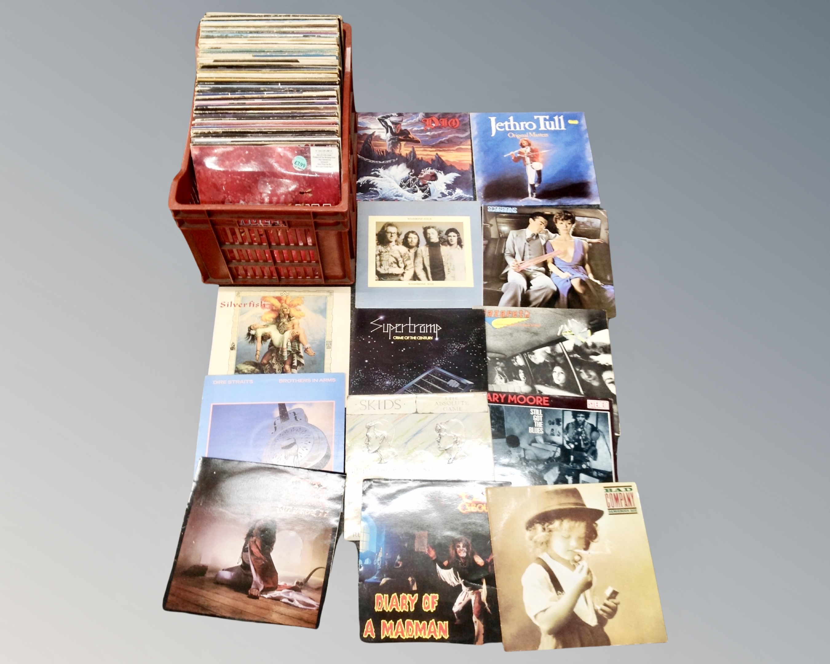 A box of vinyl records, Dire Straits, Ozzy Osbourne, Jethro Tull,