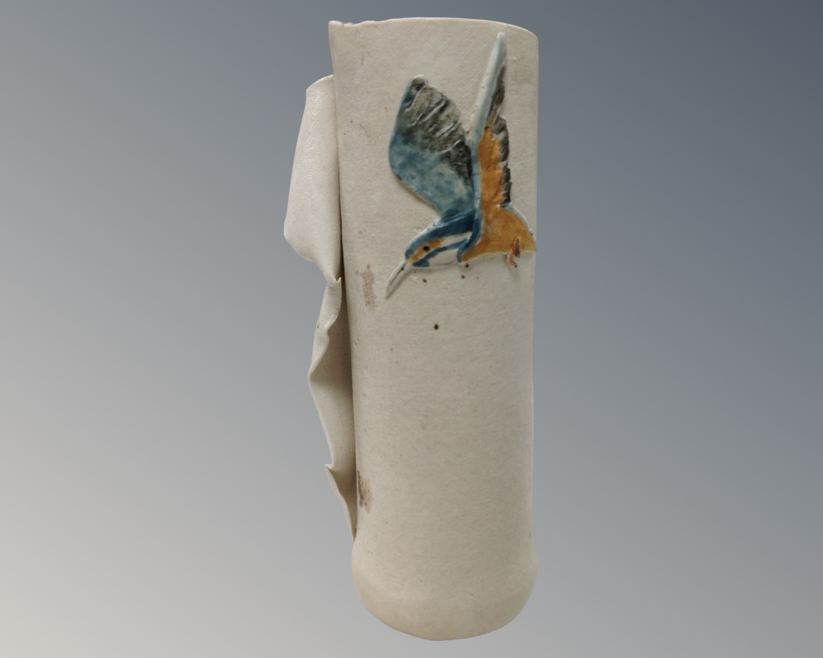 A studio pottery vase decorated with a Kingfisher