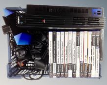 A Sony Playstion II together with collection of Playstation II games and controllers