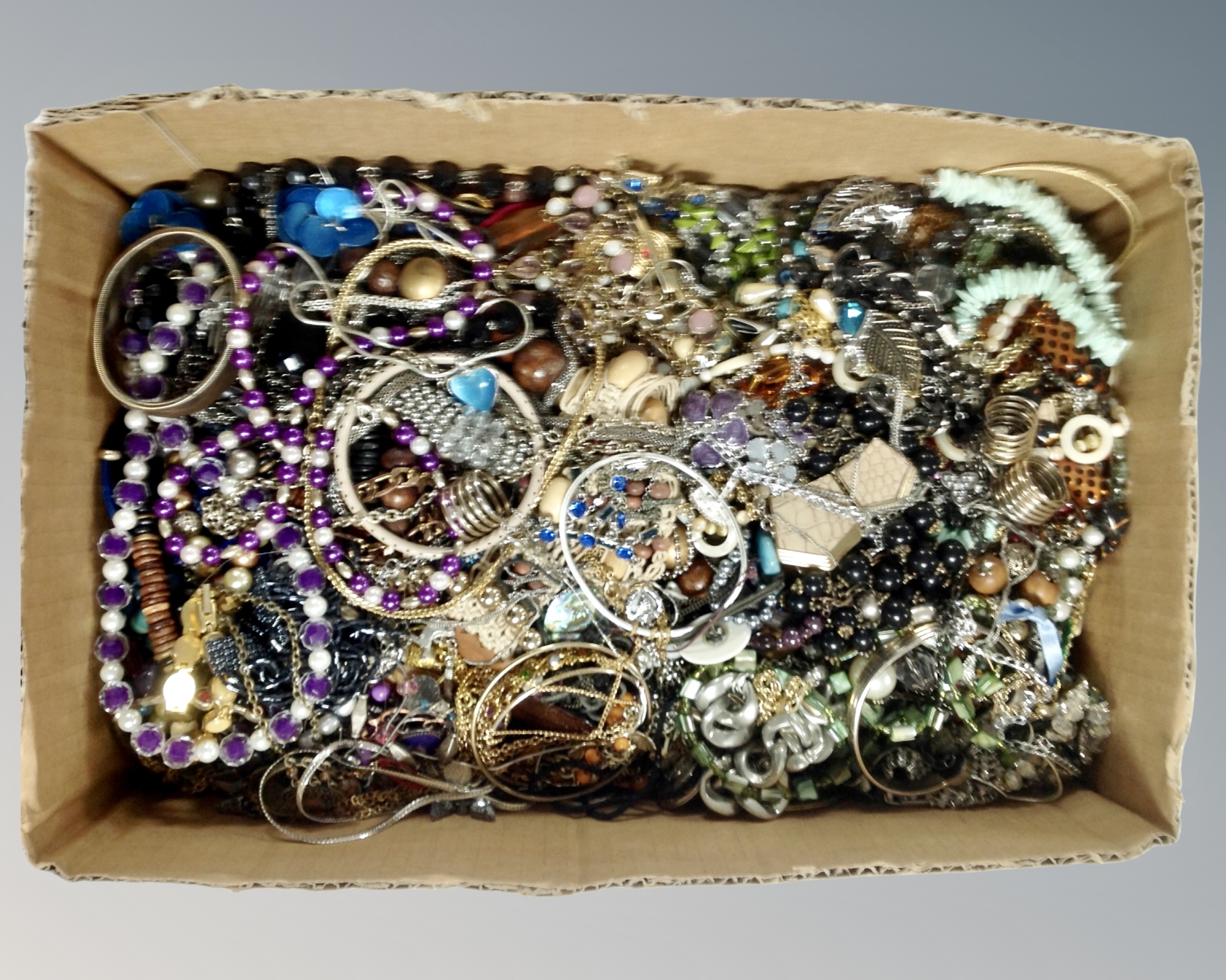 A box of costume jewellery