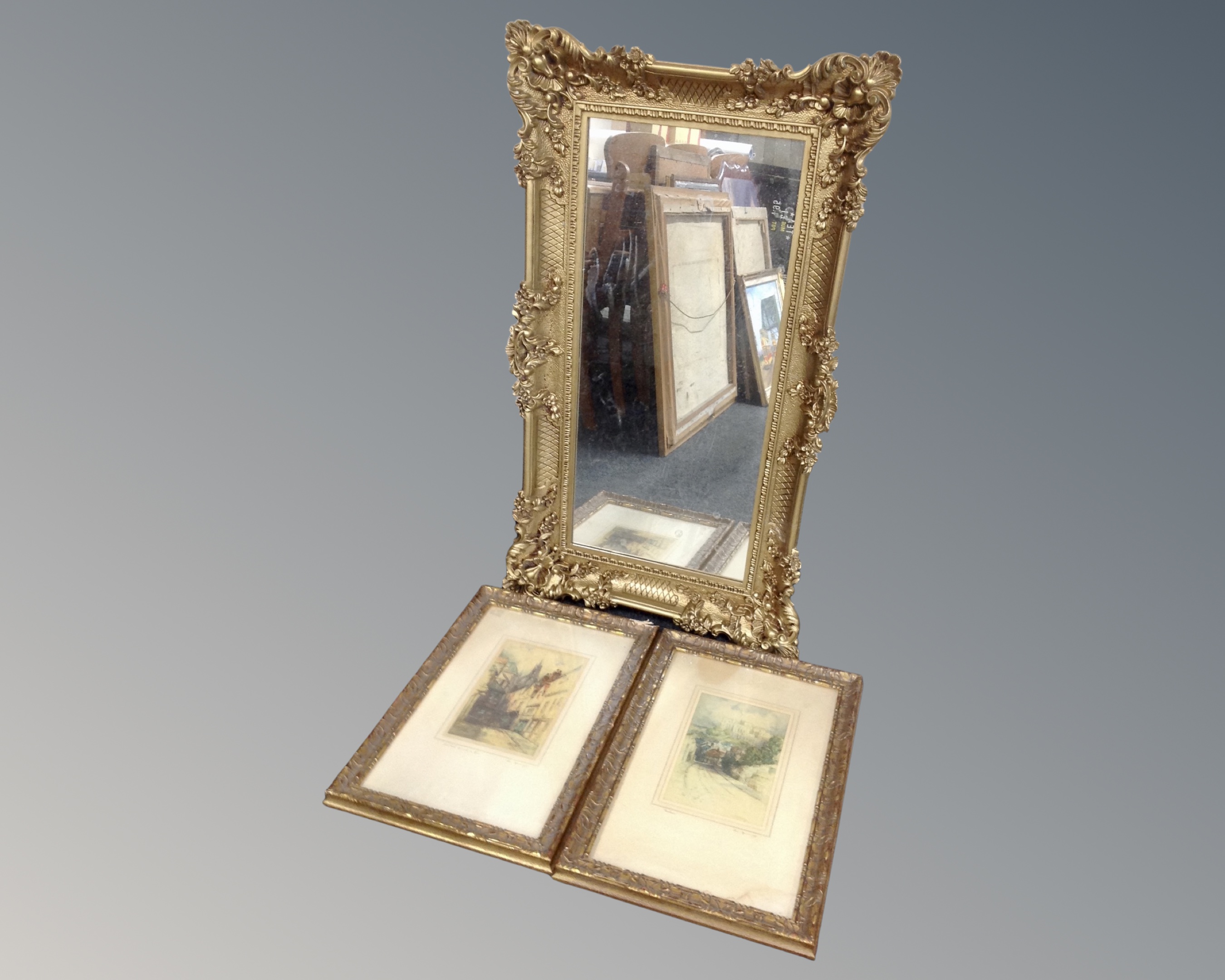 An ornate gilt framed mirror together with a pair of signed prints 'Durham' in gilt frames